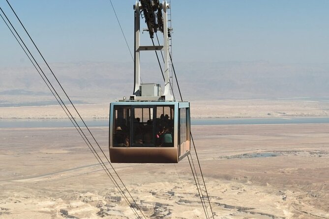 Dead Sea 1/2 Day Mini Group From Jerusalem. Up to 6 pax only - Floating in water that feels unlike a normal swim