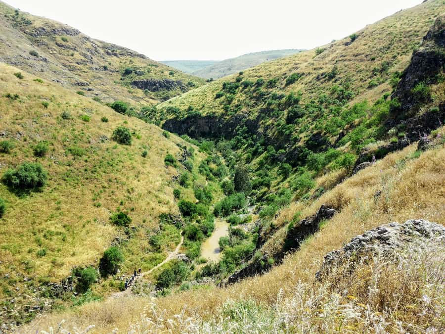 From Jerusalem: Day Trip to Golan Heights and Mount Bental - Crossing the Jordan River and passing Hamat Gader