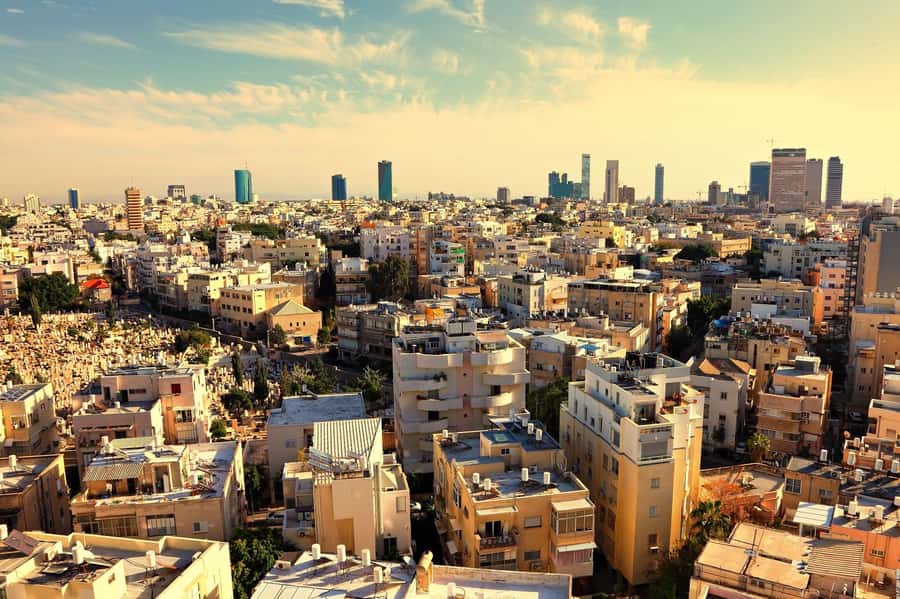 Tel Aviv: Jaffa & Carmel Market Walking Tour - Walking from HaMesila Park toward modern Tel Aviv