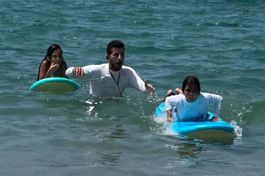 Tel Aviv: Professional Surfing Lessons at Beach Club TLV - Soft-top boards and wetsuits for a gentler first lesson