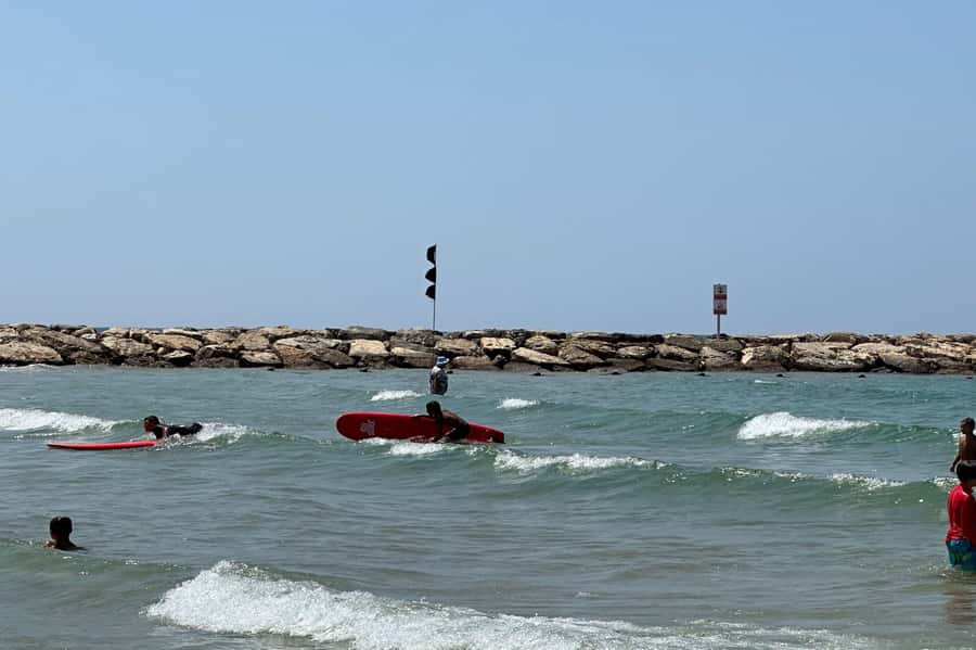 Tel Aviv: Professional Surfing Lessons at Beach Club TLV - Moving from the beach into the Mediterranean